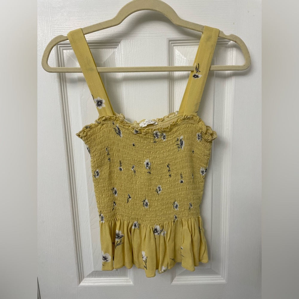 Yellow peplum tank top